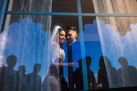 Rafael Serrano Bride & Groom reflections in window