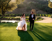 Monserat Couple running on grass