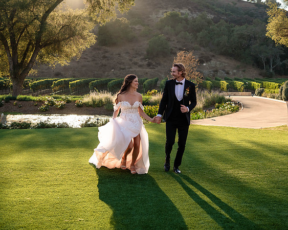Monserat Couple running on grass