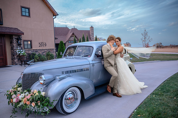 Rise Workshop Couple with car