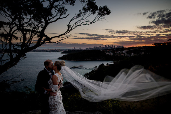Artistic - Bride groom vail in wind