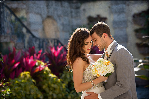 Photojournalistic Bride & Groom facing eachother