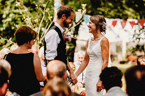 Photojournalistic Bride and Groom smile