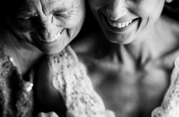 Photojournalistic Bride and Grandma smiling