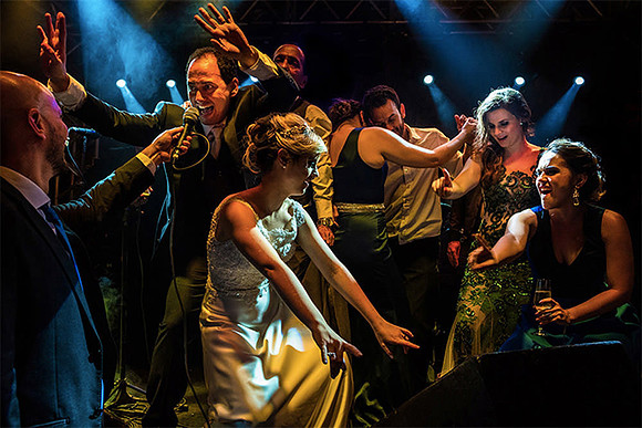 Photojournalistic Wedding party dancing