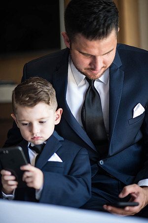 father & son on phone