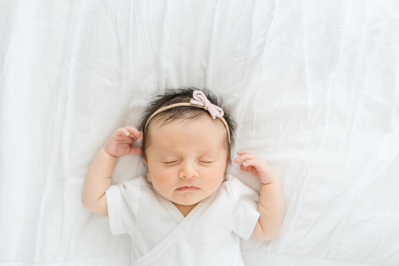 Newborn best with bow pink on head