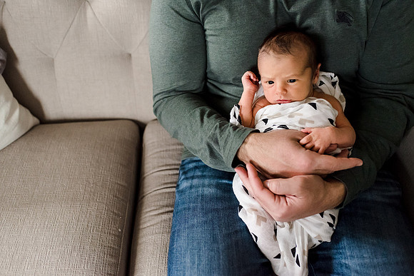 Newborn on lap