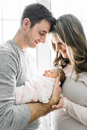 Newborn with couple