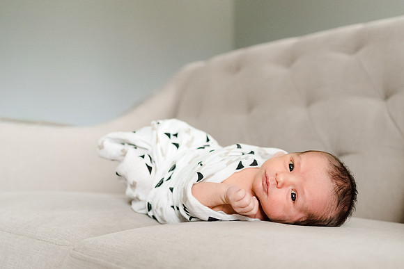 Newborn with eyes lookin at you