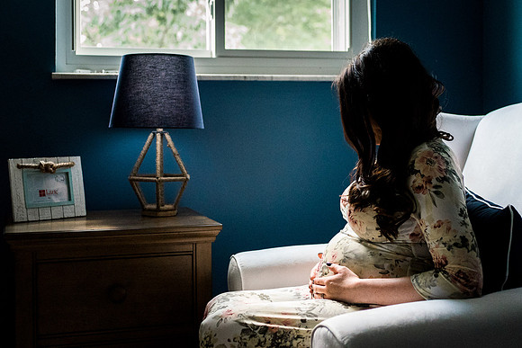 Maternity by window