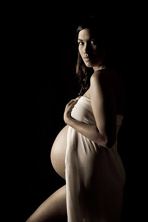 Maternity profile at camera