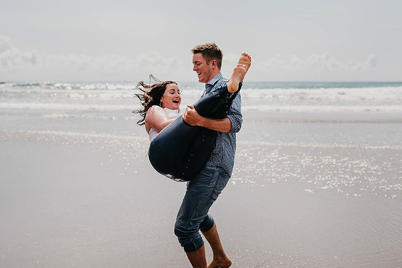 Engagement 24 with groom holding fiance before fall in V shape